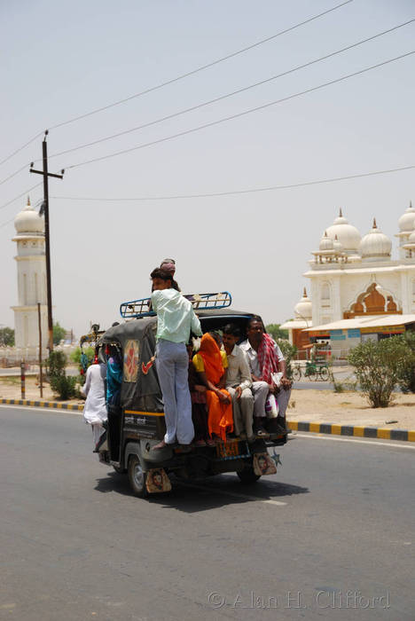 How many people can fit into an auto-rickshaw?