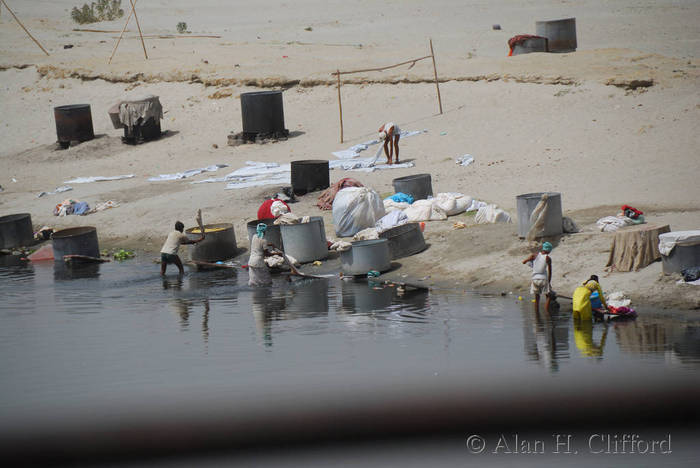 Washing clothes in the Yamuna river, Agra